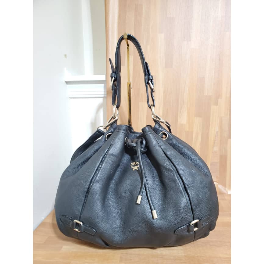 MCM Visetos Leather Drawstring Bucket Bag (SHG-28288) – LuxeDH