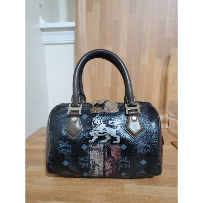 Mcm princess lion clearance handbag