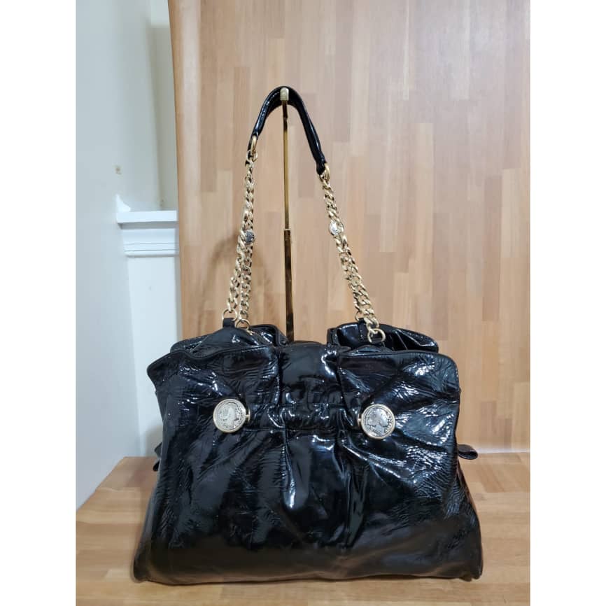This authentic GUCCI Vintage Micro GG Canvas Shoulder/Crossbody Bag Beige is in it's pre-owned condition. The exterior coated canvas is clean. Interior is clean. The base edges shows rubbing wear. Measurements: Length: 9.25" Width: 3" Height: 7" Shoulder strap drop: 20-22"
